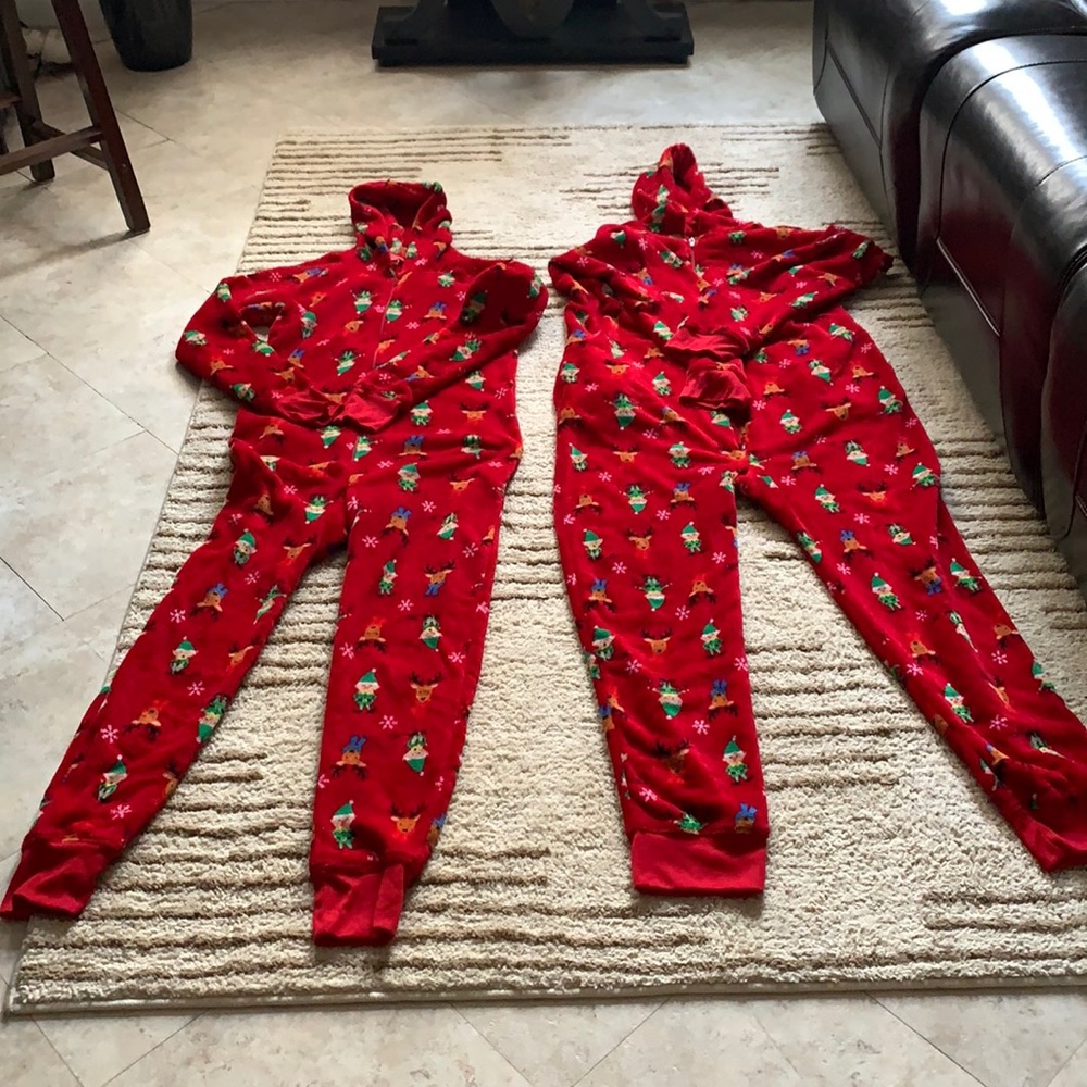 His and hers Christmas onesies.